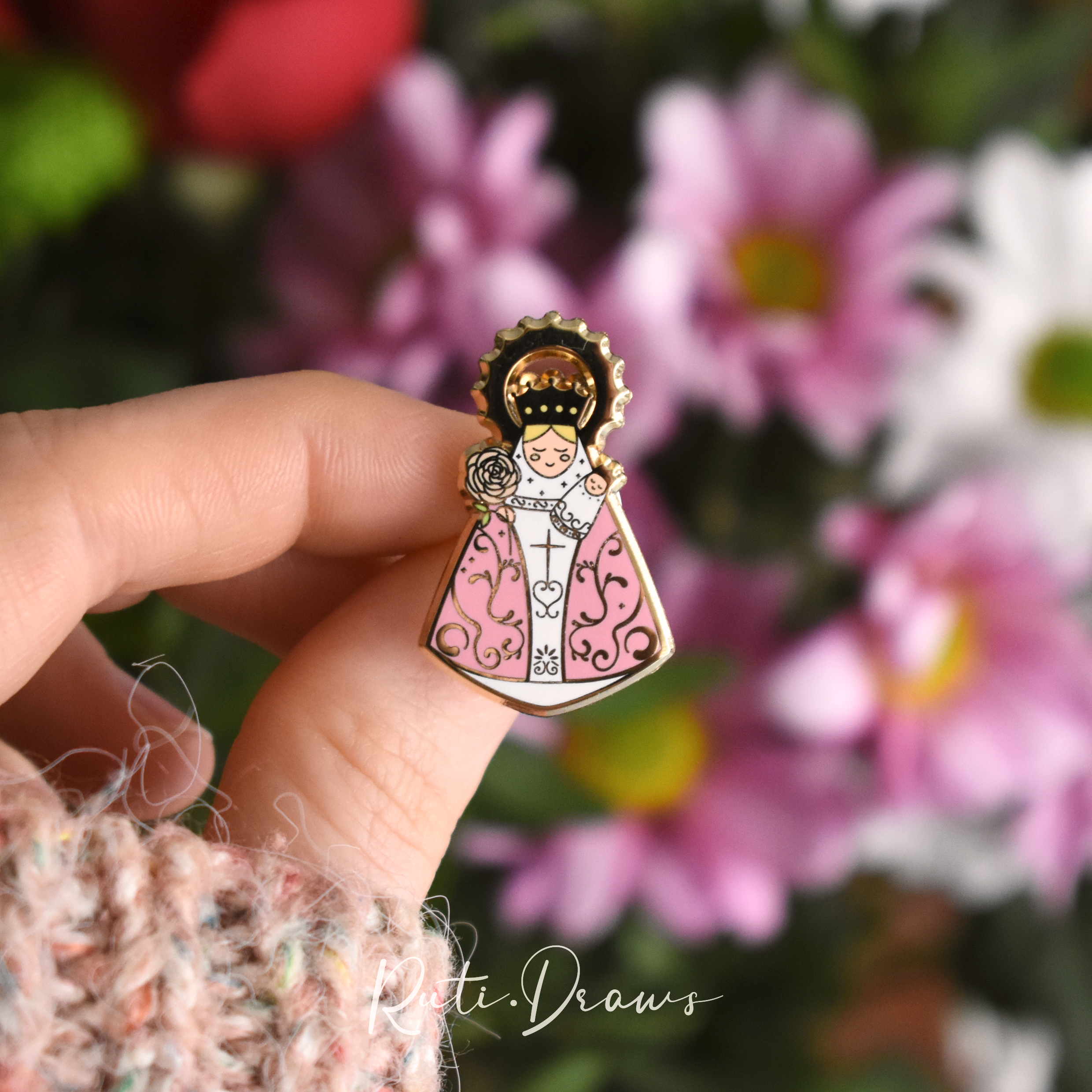 Close-up of the Our Lady of Covadonga pin