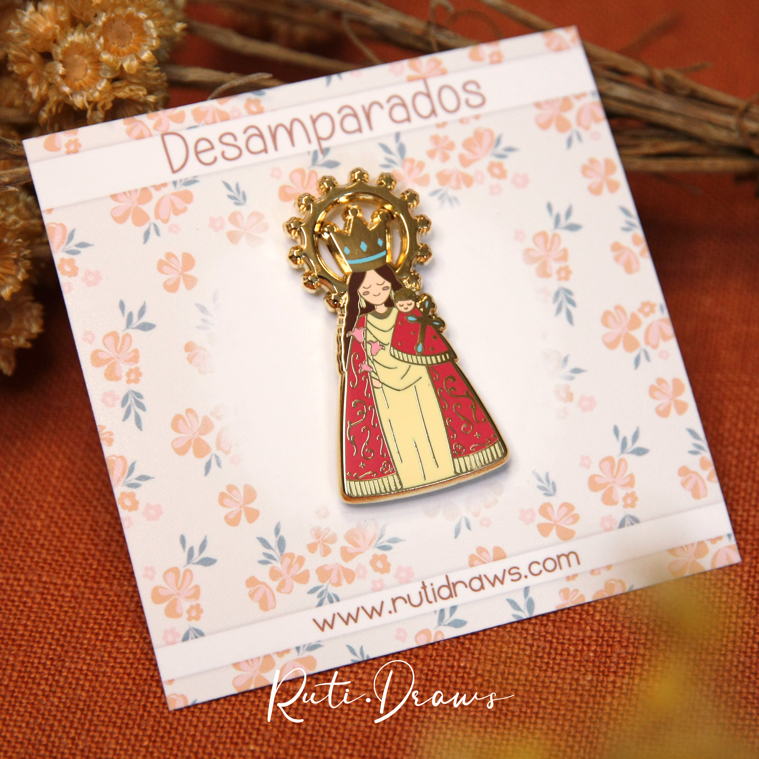 Close-up of the Our Lady of the Forsaken pin