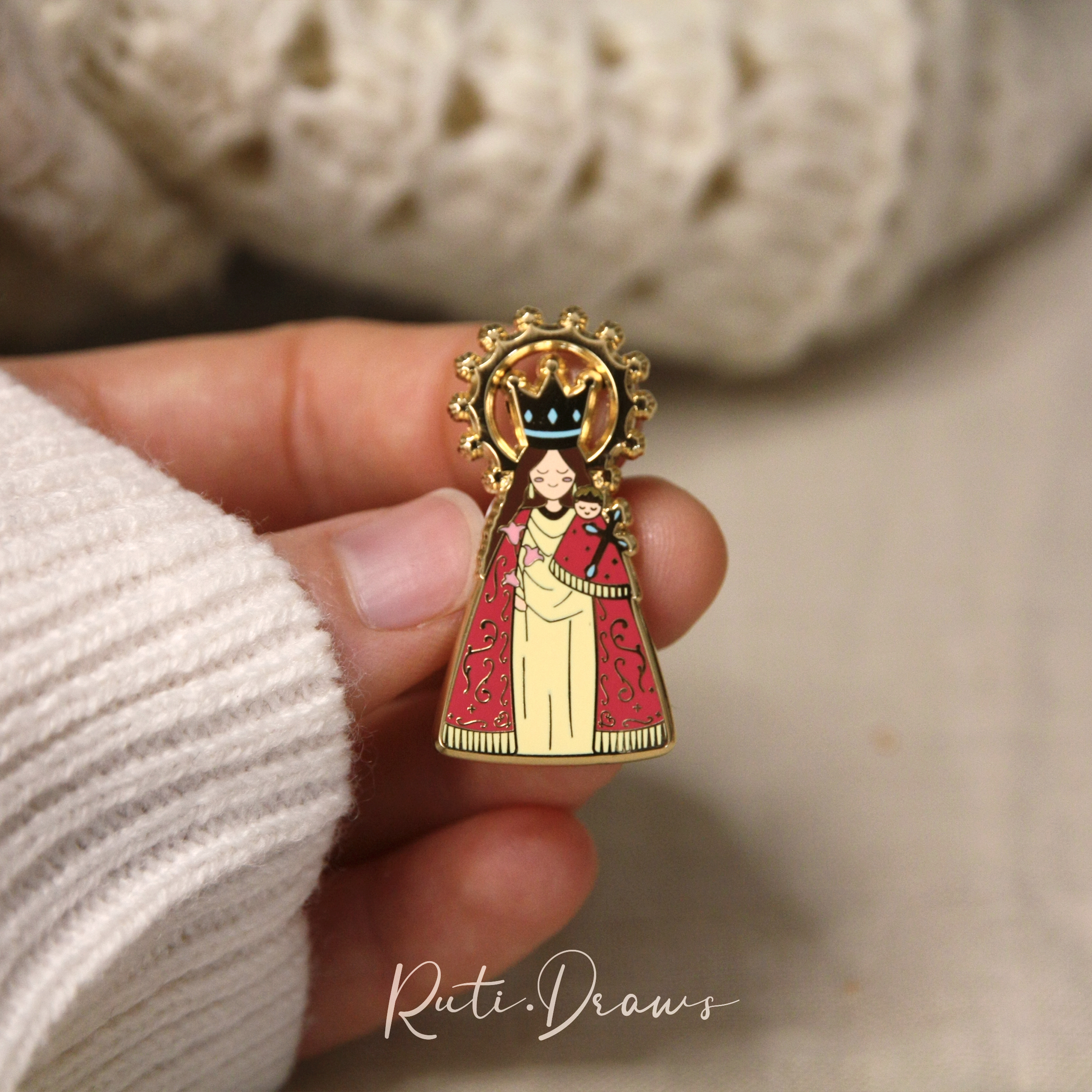 Back of the Our Lady of the Forsaken pin