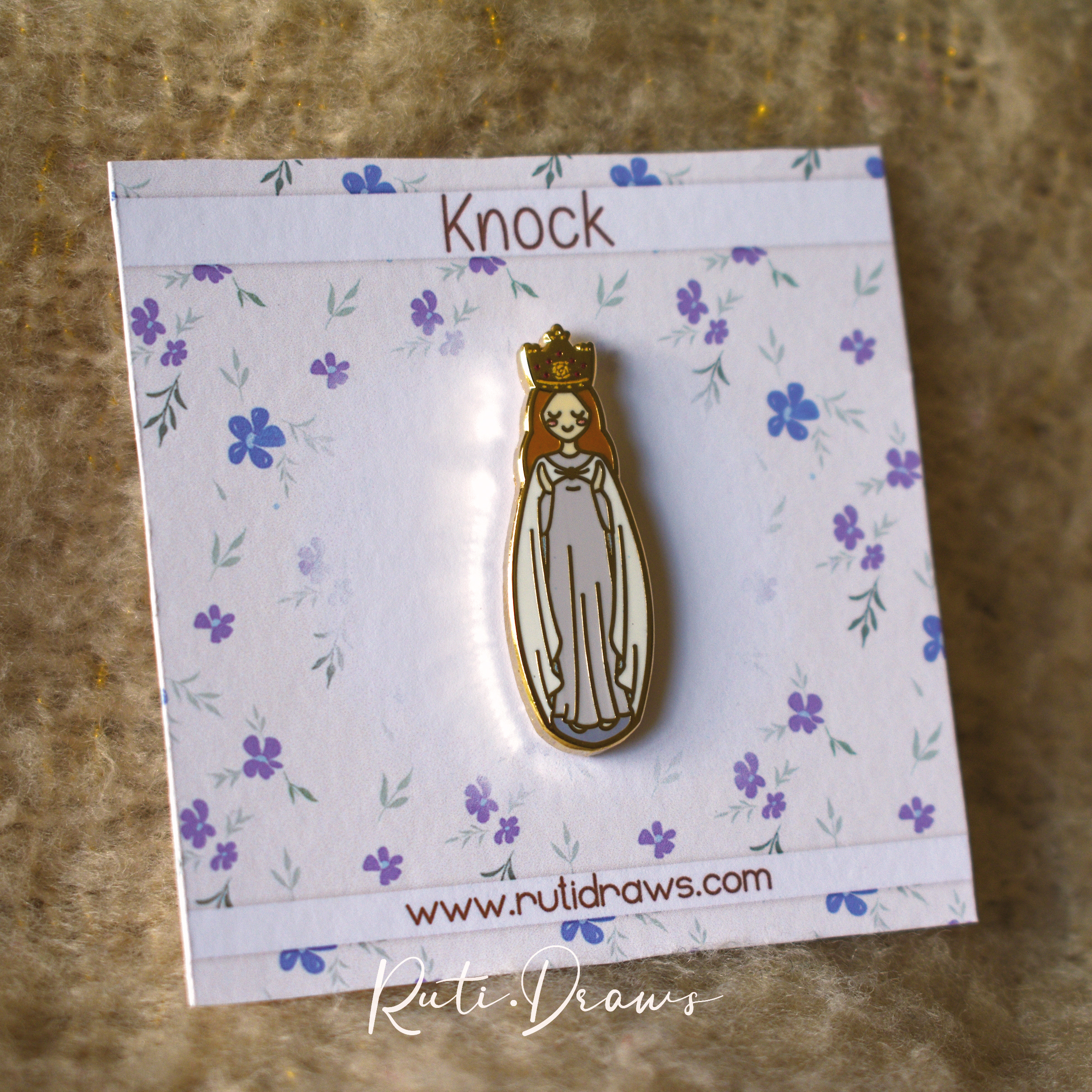 Close-up of the Our Lady of Knock pin