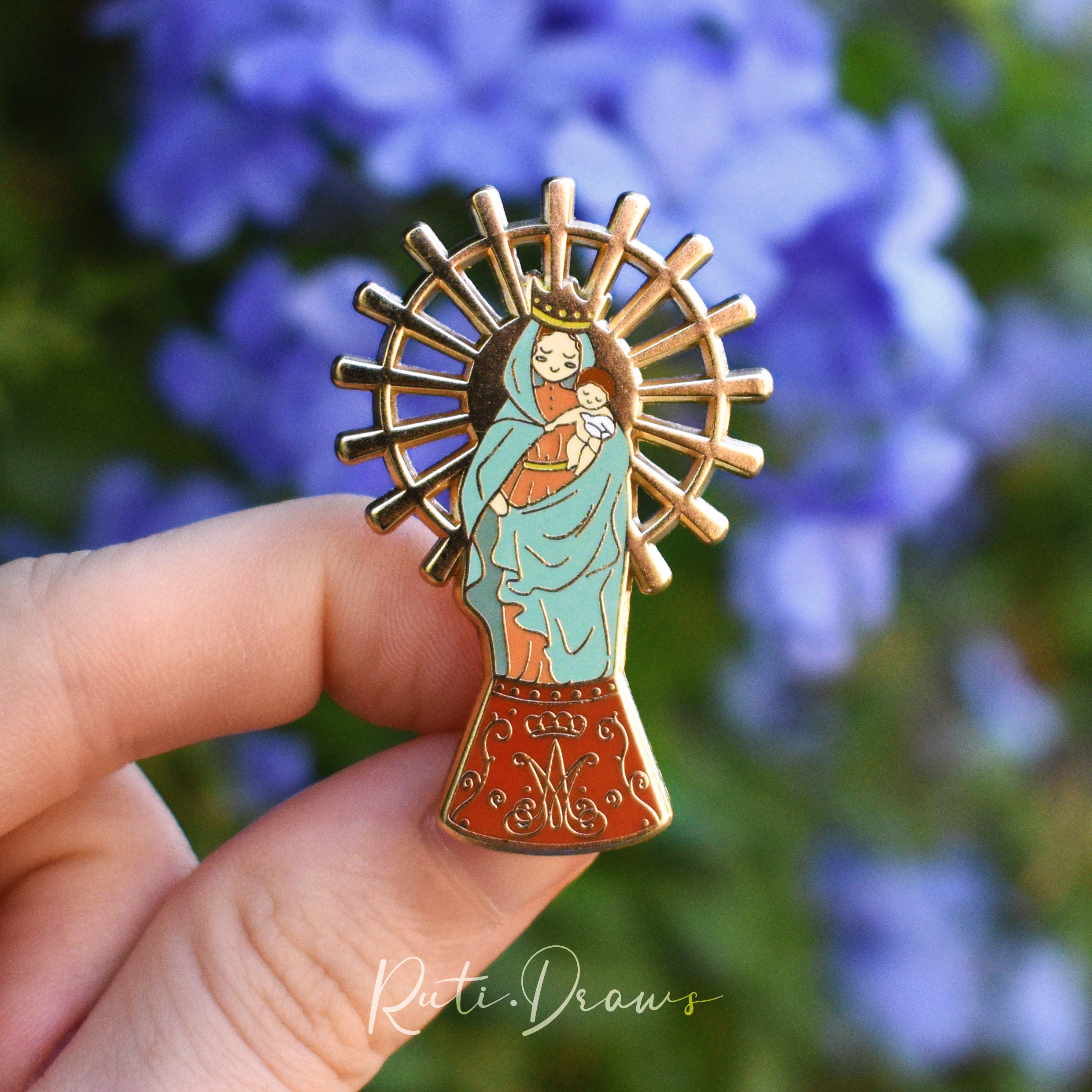 Close-up of the Our Lady of the Pillar pin